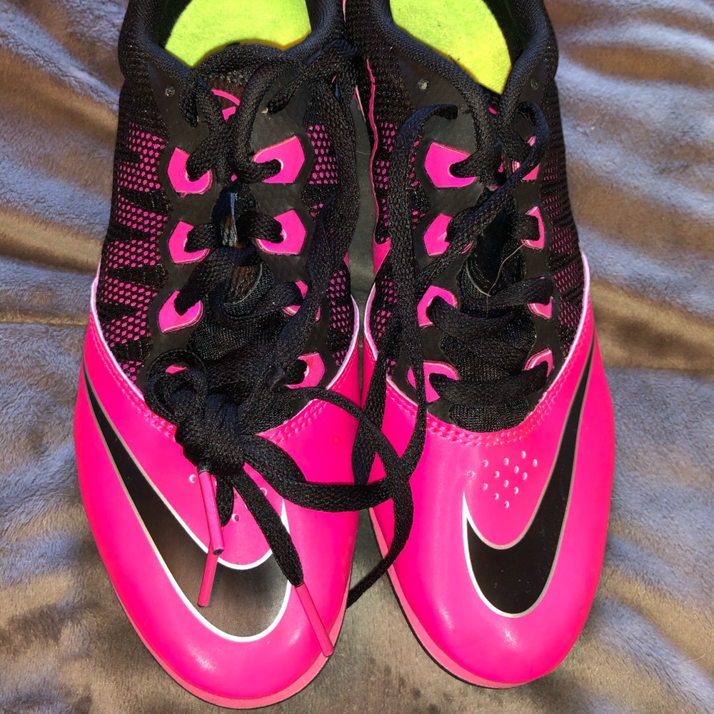 Running shoes with spikes